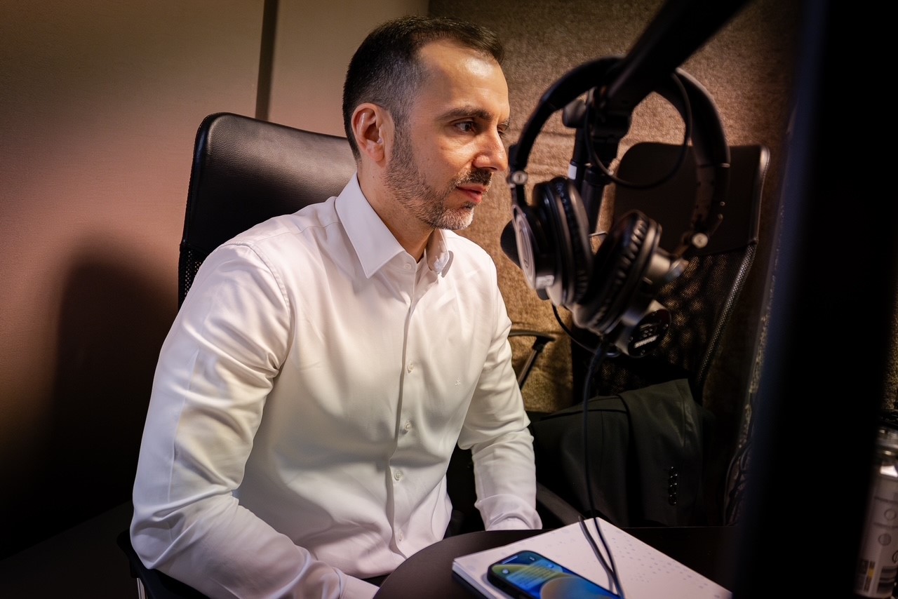click image to listen to interview